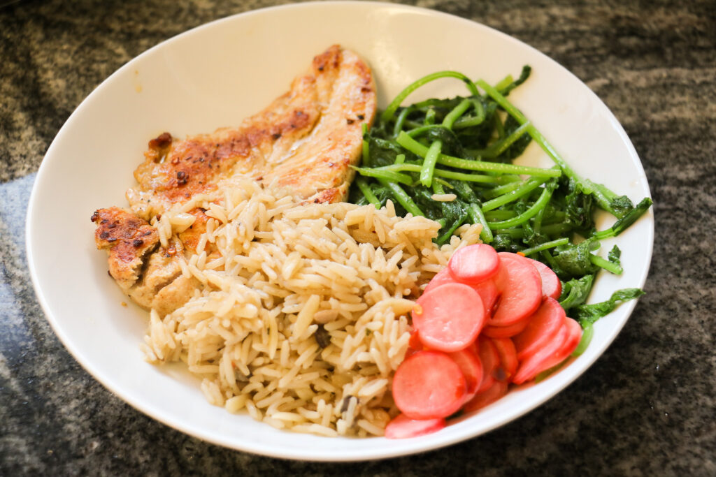 sauteed chicken with spicy pickled radish and radish greens
